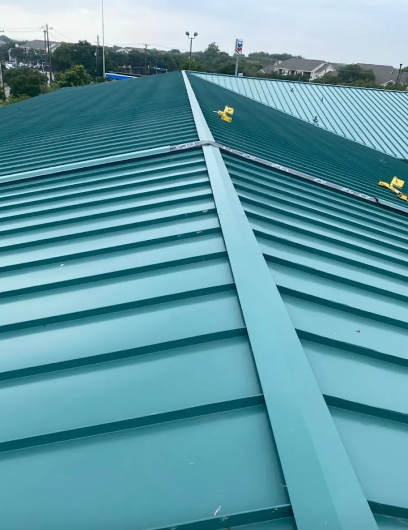 Green commercial metal roof ridge and valley for Metal Roof Repair in Lower Merion